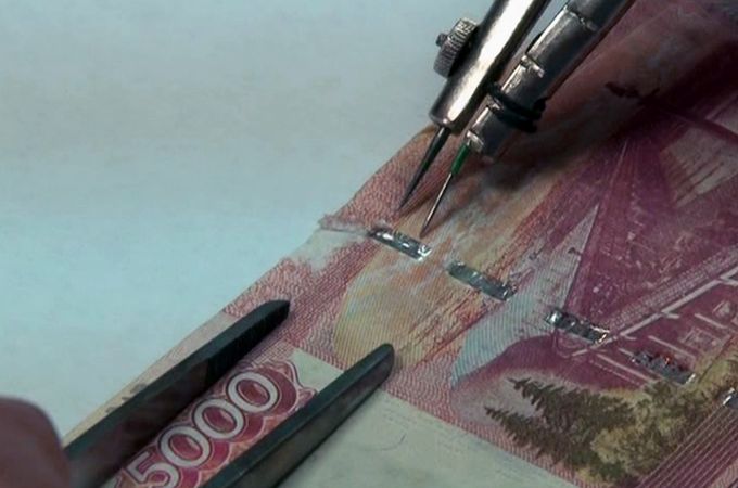 О фальшивых купюрах в Новосибирской области сообщили эксперты